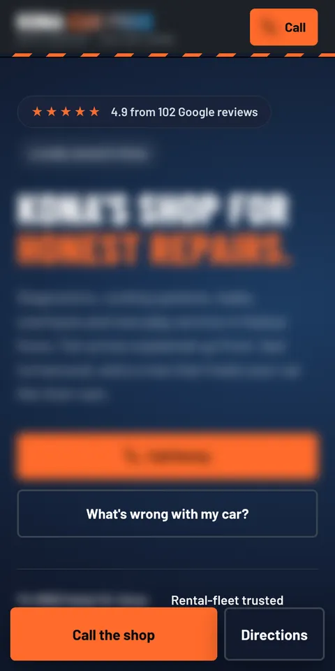 Phone view of a auto repair website we built, with the name and number blurred